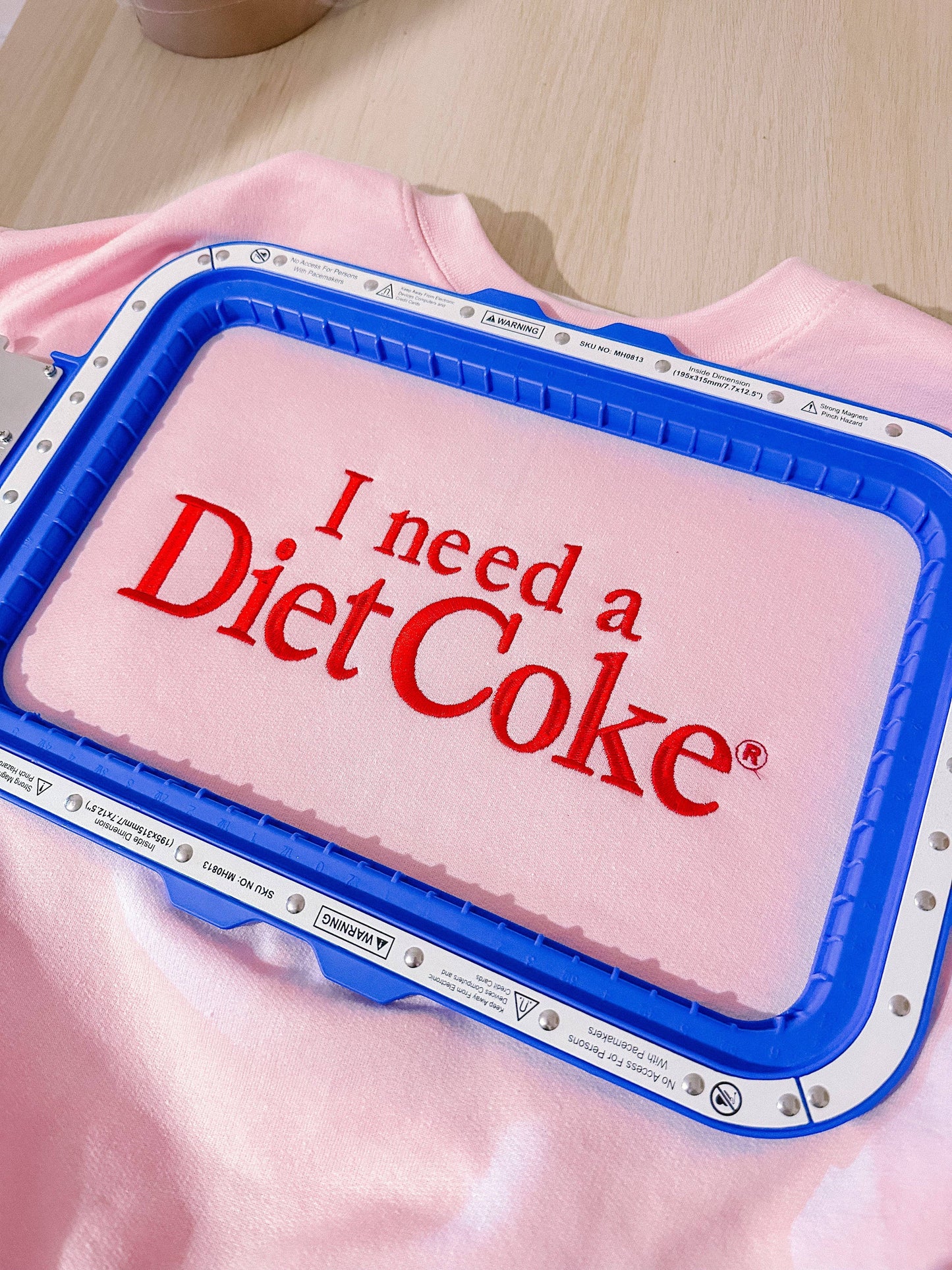 I Need A Diet Coke embroidered crewneck
