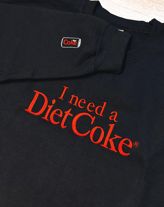 I Need A Diet Coke embroidered crewneck sweatshirt with sleeve detail